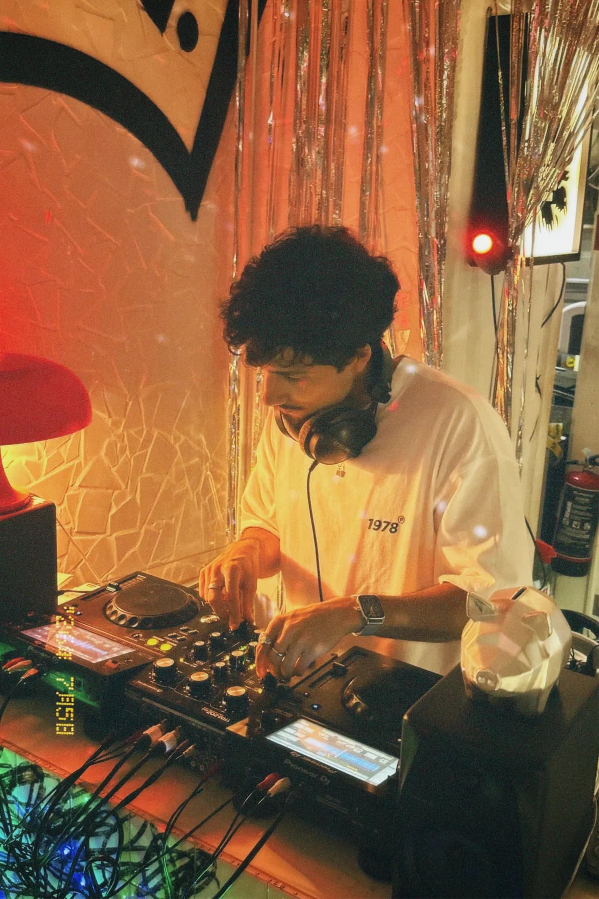 João DJing behind a mixer